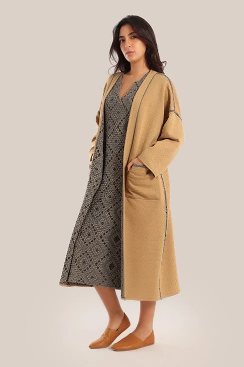 Oversized reversible quilted coat